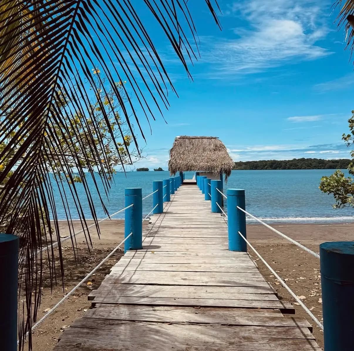 Wooden pier reaching into the Pacific at Isla Boca Brava